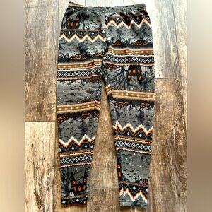 Woman’s size Medium very soft, fleece, stretch, Halloween leggings